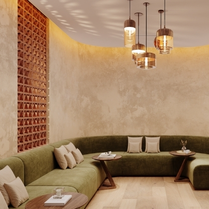 Viva Day Spa relaxation lounge in Atlanta, Georgia with a curved olive green sofa, glass pendant lights, and a terracotta lattice screen wall