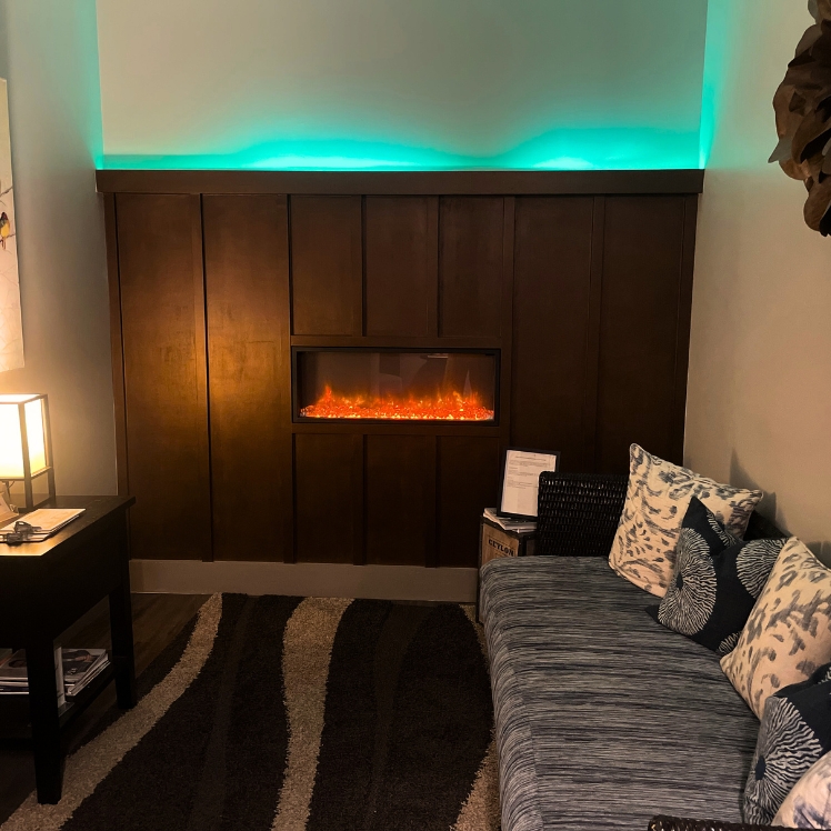 Alpharetta-interior-fireplace-relaxation-couch-room at Natural Body in Atlanta