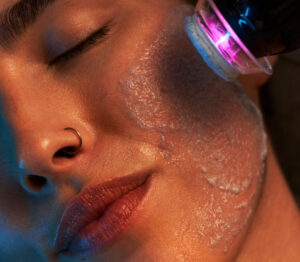 glo2facial-glo-2-facial-woman-facial-scrub-at-natural-body-spa-med-spa-atlanta-767x670