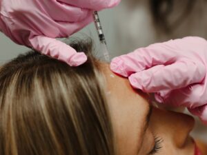 Woman receiving Dysport Injection at Natural Body Spa + Med Spa in Atlanta 276x276