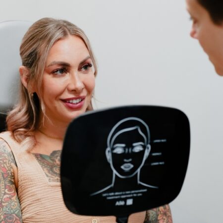 Woman receiving Injectable Consultation at Natural Body Spa + Med Spa in Atlanta, 276x276