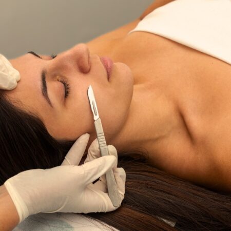 woman receiving dermaplaning facial at Natural Body Spa + Med Spa in Atlanta, GA