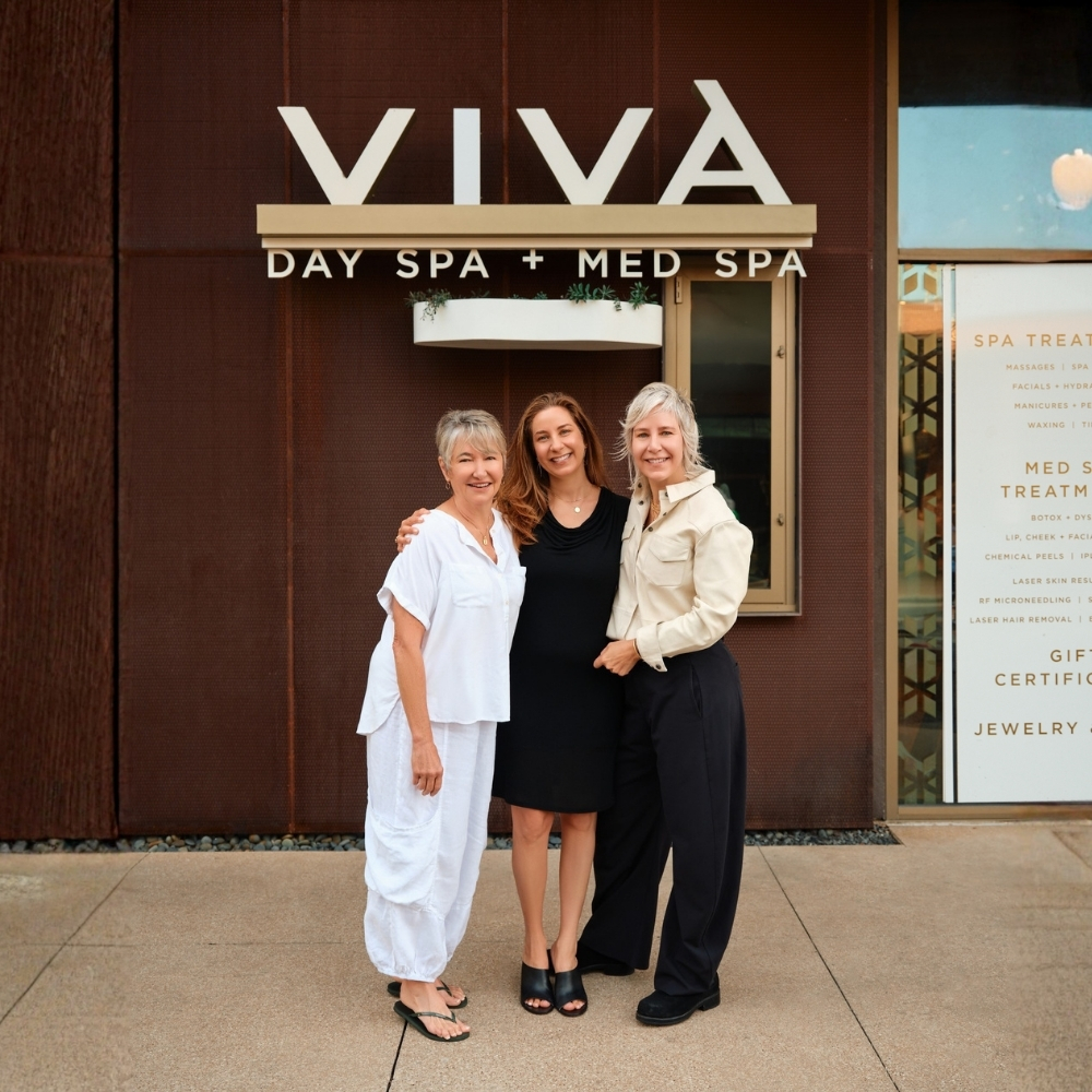 Natural Body founder Cici Coffee with Viva Day Spa + Med Spa co-founders and sisters, Maya Aroch and Laurie Aroch, in front of the Viva Day Spa + Med Spa Domain Northside location in Austin, Texas.